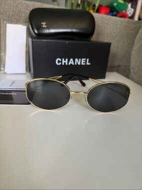 CHANEL Gold Frame Black Lens Oval Sunglasses